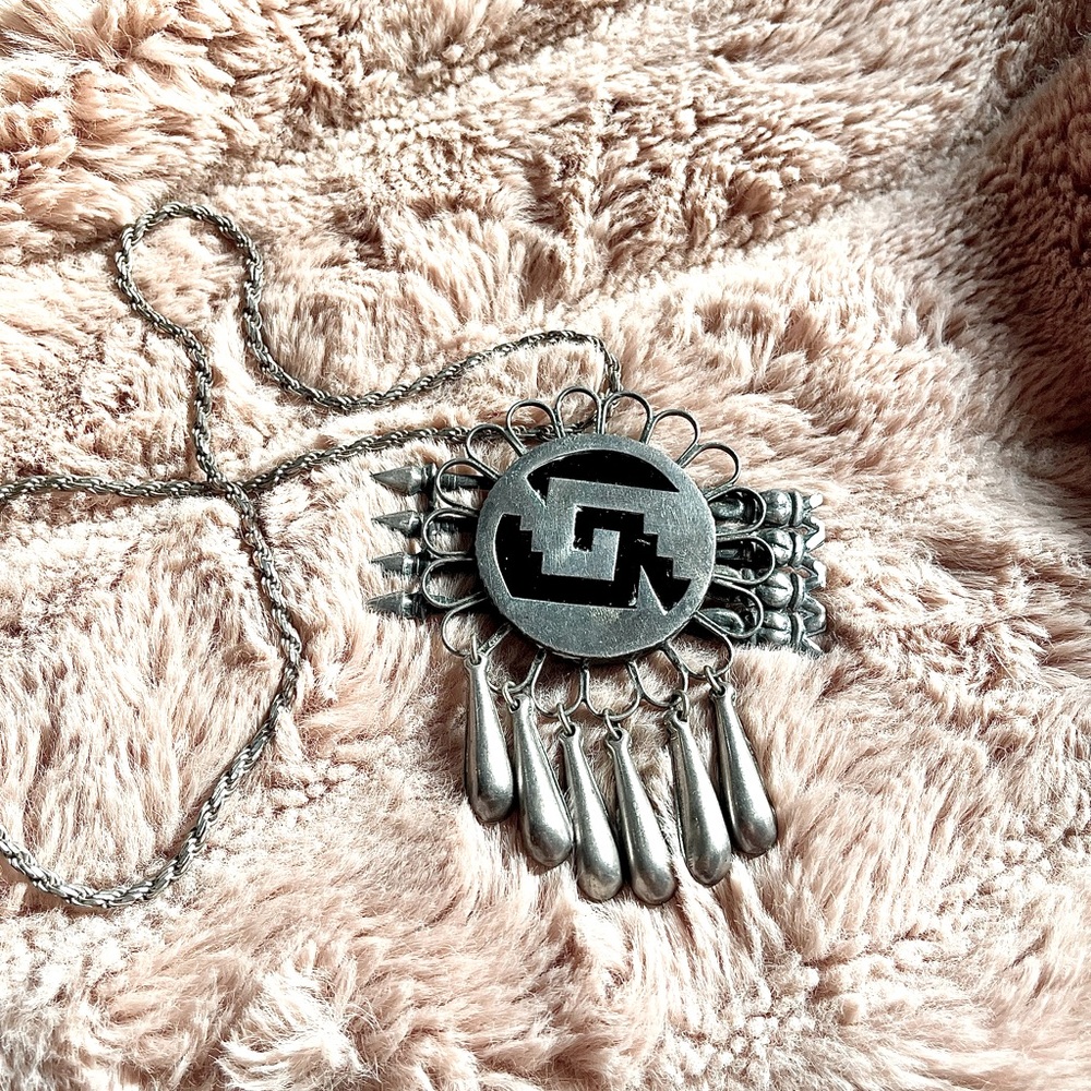 Vintage Native American sterling broach on a silver plated rope chain